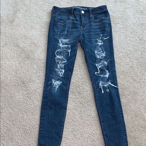 •Pre ripped blue AE jeans•